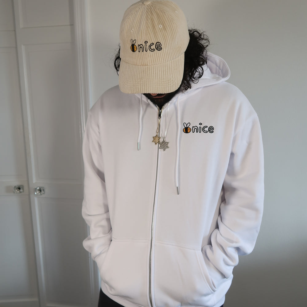 
                      
                        Bee Nice Embroidered Zip Up in Schmear
                      
                    