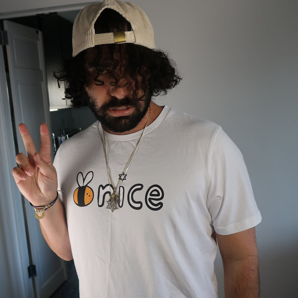 
                      
                        Bee Nice Logo Tee in Schmear
                      
                    